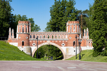 The ancient Figured Bridge in a summer landscape. Tsaritsyno Palace Complex. Moscow, Russia
