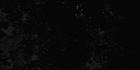 Obraz premium Dark grainy texture with scattered bright specks resembling a night sky