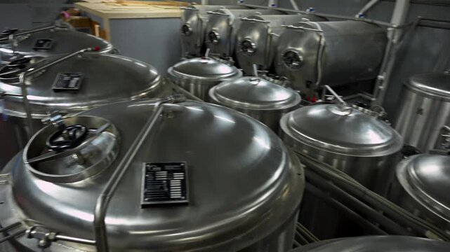 Craft Beer Brewing Process Inside a Private Brewery With Tanks and Equipment in Action