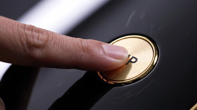 Close up view of a finger pushing a luxurious golden vip button, symbolizing exclusive access, privileged service, and first class treatment for a very important person with elite status