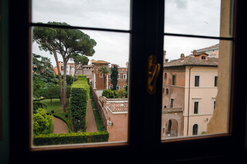 Obraz premium View of Roman Garden Through Window
