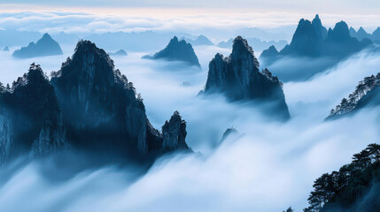 Mountain peak cloud mist fog sunrise over granite ridge, tranquil blue landscape above valley