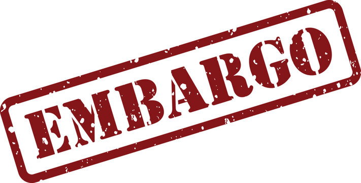 Significant red grunge rubber stamp clearly indicating the important word embargo on a clean white surface