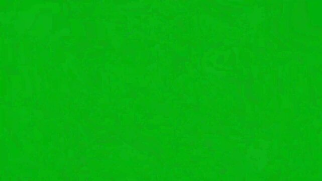 Abstract geometric shapes floating on green background with copy space