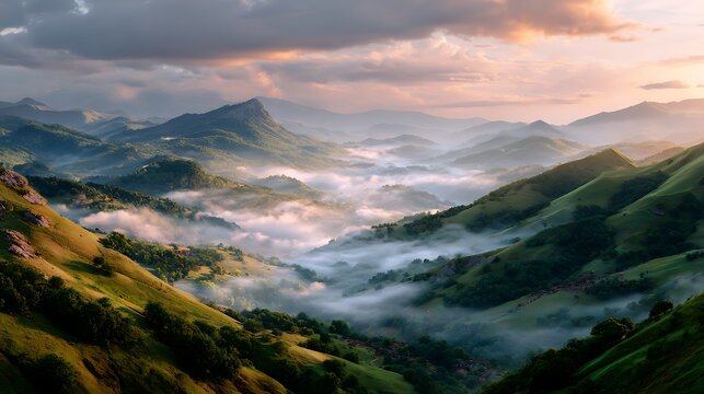 Dramatic misty mountain valley at sunrise in Northern Pakistan landscape scene