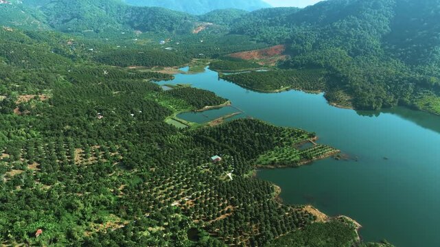 Aerial View of Ham Thuan Lake and Da Mi Mountains in Binh Thuan, Vietnam
the vast freshwater lake, lush green mountain ranges, and the unique topography of the Central Highlands border