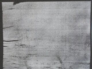 Photocopies of a black and white sheet of paper with a background or texture with grain and noise illustration