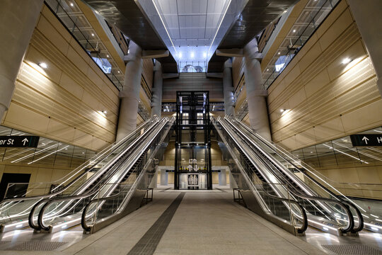 Rows of Escalators at Concourse of Martin Place Station of Metro North West and Bankstown Line of Sydney Metro in SYDNEY, NEW SOUTH WALES, AUSTRALIA on 12 SEP 2024
