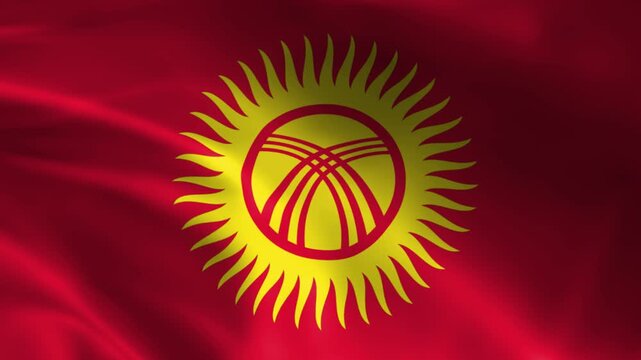 Kyrgyzstan flag waving in the wind national symbol with sun and yurt elements representing patriotism and national identity isolated on black background
