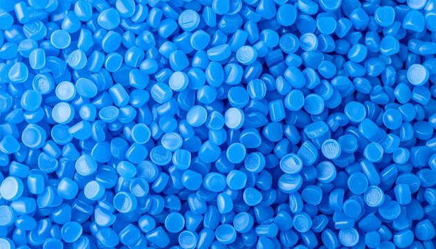 Bright blue plastic pellets for manufacturing and recycling industry background