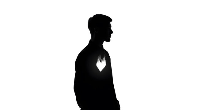Inner Flame Silhouette: A black silhouette of a person, symbolizing inner strength and resilience, stands with a glowing heart, embodying passion and emotion. 