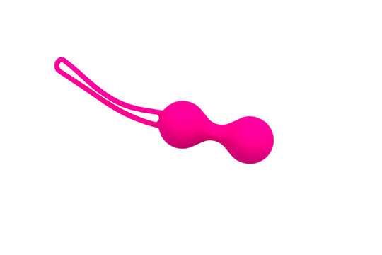 Ben Wa balls or Geisha balls isolated on white background. Pink double vaginal balls