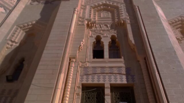 A tourist attraction or a landmark in Alexandria, Egypt, is called Imam Al Busiri Mosque. It's opposite the Mediterranean Sea and the Abu Al Abbas Mosque. Al-Busiri is one of Abu Al Abbas's students.