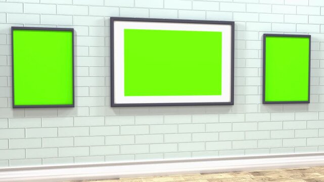 Three Green Screen Frames Hanging on a Brick Wall