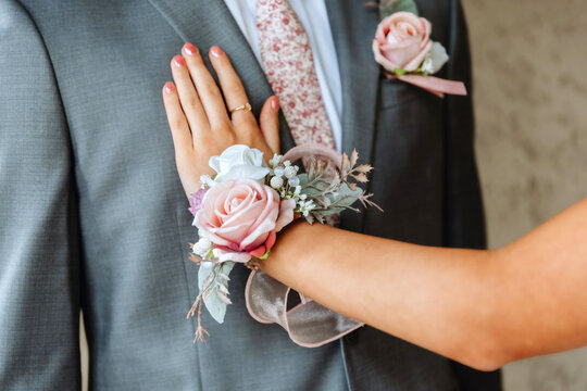Prom dates with boutonniere and corsage