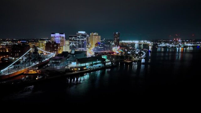 Aerial drone view of downtown Norfolk skyline at night, Virginia