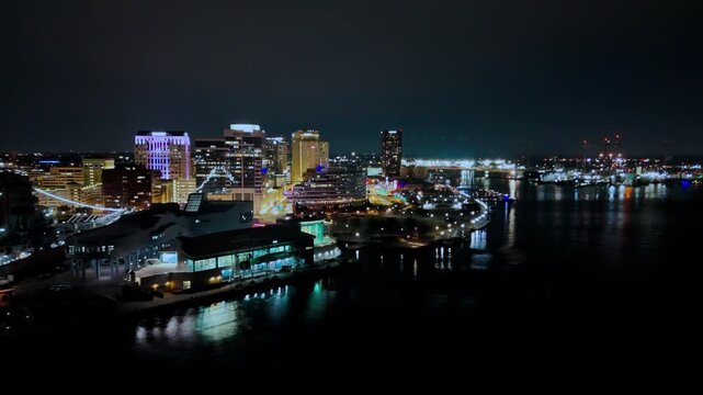 Aerial drone view of downtown Norfolk skyline at night, Virginia
