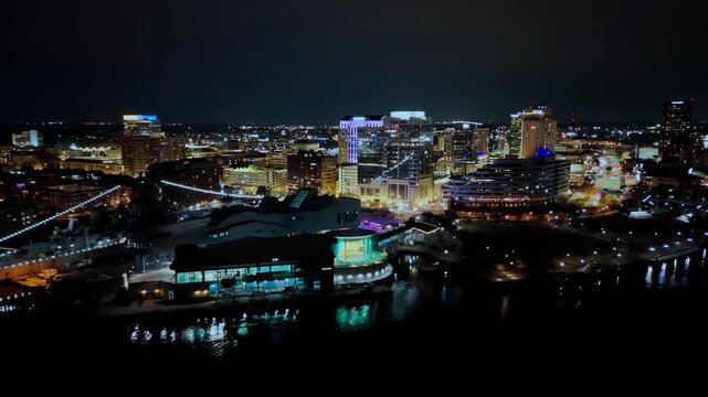 Aerial drone view of downtown Norfolk skyline at night, Virginia