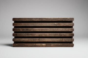 Stacked Textured Brown and Black Rectangular Panels Under Soft Studio Lighting on Grey Background