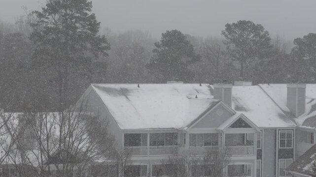 Winter Storm Gianna in Greenville, South Carolina. Strong Snow Blizzard in Winter, Greenville, South Carolina. Blizzard Strong Wind And Heavy Snow Lash Town. Heavy Snowstorm in Residential Area.