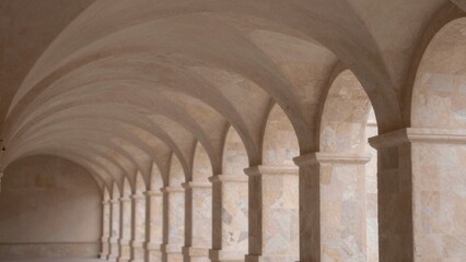 Fototapeta premium Grand arched corridor historic building lined beige stone columns each supported curved arch arranged neat