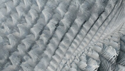 High-angle view of textured, light gray ridges