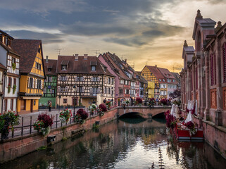 Center of old Historic town Colmar at the evening, also known as Little Venice, with traditional colorful houses on idyllic river Lauch, Colmar, Alsace, France