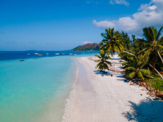Fototapeta premium Serene beaches and crystal-clear waters at Grand Anse in Praslin, Seychelles
