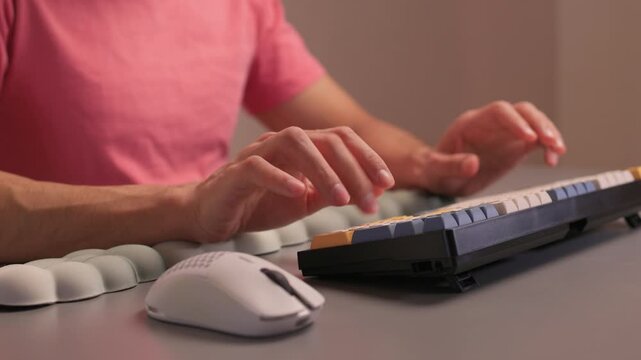 Keyboard setup showcase, Ergonomic mechanical keyboard display, Closeup of tactile switches on custom keyboard, Designer testing pastel keycaps with ergonomic wrist cushion setup