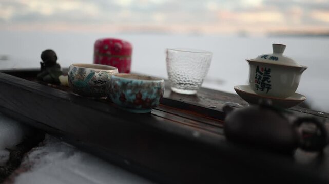 slow living tea ceremony outdoors winter lifestyle peaceful pause from busy life translation eternal happiness