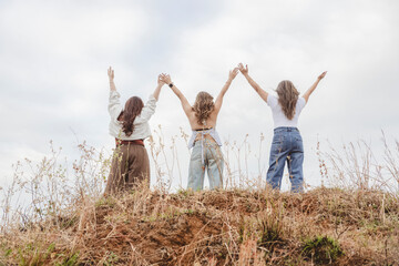 group of friends having fun in the park