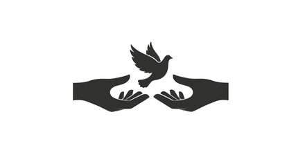 Black silhouette of hands holding dove.
