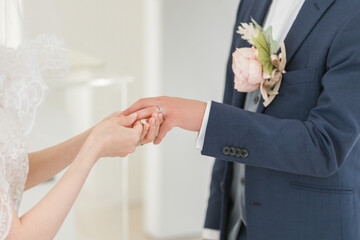 Bride and groom exchanging rings at a wedding venue (wedding, wedding, bridal)
