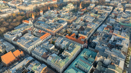 Fototapeta premium Overhead Aerial View of Dense Residential City Blocks in Krakow During Autumn With Historic Rooftops
