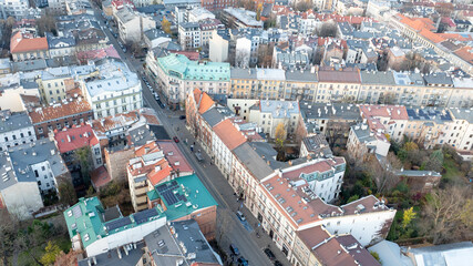 Fototapeta premium Aerial View of Residential Streets in Krakow Old Town in Autumn Showing Historic Tenement Houses and Urban Blocks