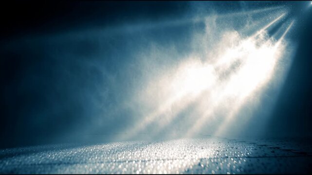 Mysterious Spotlight: Dramatic rays of light pierce through a misty atmosphere, illuminating a textured surface below, creating a captivating and cinematic scene. 