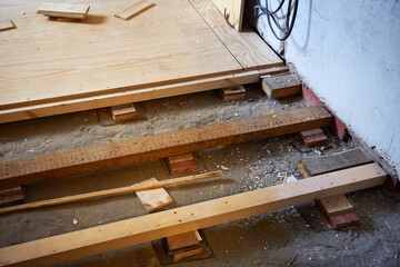 Laying new wooden floors in the room. Renovation of residential premises