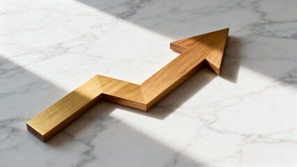 Wooden arrow symbolizing growth and progress on a light marble surface