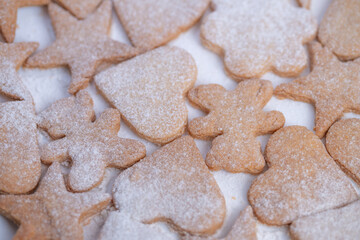 Baked sweet treats, Cookies cooling after baking process, Warm kitchen filled with fresh cookie aroma, Enjoying tasting experience of newly baked powdered sugar cookies