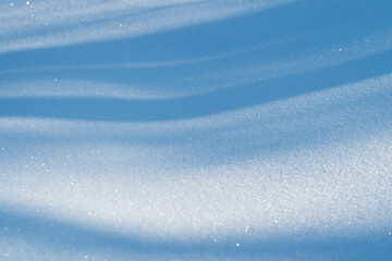 Obraz premium Vivid snow and sunlit ice sparkle with flowing textures and details, Brightly shining snow and illuminated ice display intricate glittering patterns and smooth flowing textures