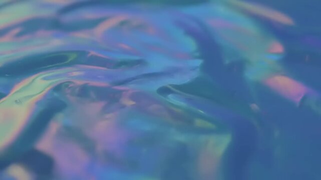 Generated video of rippling water surface with colorful reflections and abstract patterns