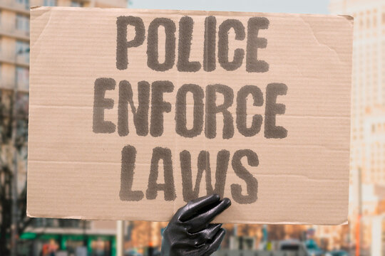 "Police Enforce Laws" Officers uphold traffic safety regulations. POLICE. ENFORCE. LAWS. TRAFFIC. REGULATIONS.
