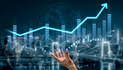 A hand reaches toward a glowing graph depicting a rise in data trends, representing business growth...
