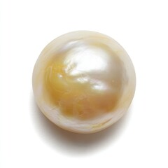 A close-up of a lustrous, iridescent, and golden-hued pearl against a white background