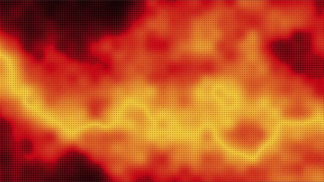 A blazing fire burns intensely with flames and embers in a dark environment.
