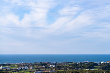 Obraz premium idyllic seascape with clouds and seaside village