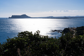 idyllic seascape with sunlight-reflected sea