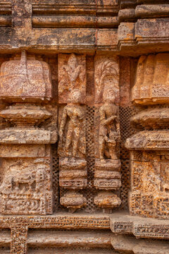 This erotic stone sculpture at the Konark Sun Temple depicts an intimate couple in close embrace, symbolizing fertility, human desire, and tantric philosophy in Odishan temple art.
