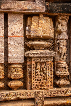 This erotic stone sculpture at the Konark Sun Temple depicts an intimate couple in close embrace, symbolizing fertility, human desire, and tantric philosophy in Odishan temple art.
