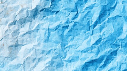 Crinkled blue paper texture with light and shadows in simple design